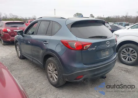 2014 Mazda Cx-5 Touring z USA, uszkodzony, nr VIN JM3KE2CY6E0397042